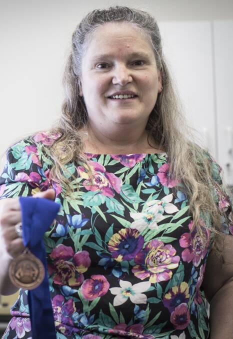 RESEARCH ACKNOWLEDGED: University of Wollongong Associate Professor Barbara Meyer shows off her prestigious NSA Medal. Picture: Supplied