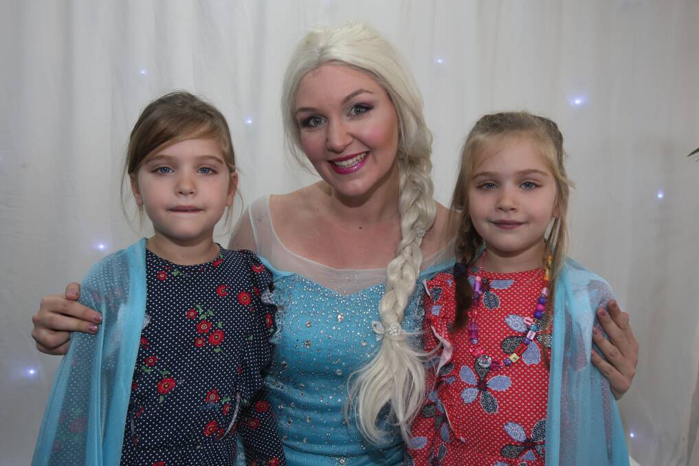 KIDS' FAVOURITE: Vian Michael, Elsa and Isabella Michael at the high-tea event at Novotel Northbeach on Thursday. Picture: Robert Peet 