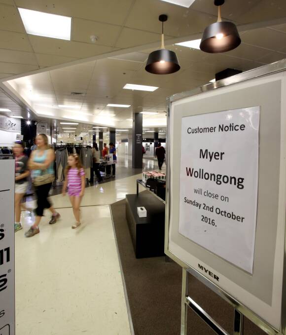 END OF AN ERA: A steady stream of shoppers looked for some bargains in the near empty Myer Wollongong store on Sunday. The department store closed for good on October 2. Picture: Robert Peet