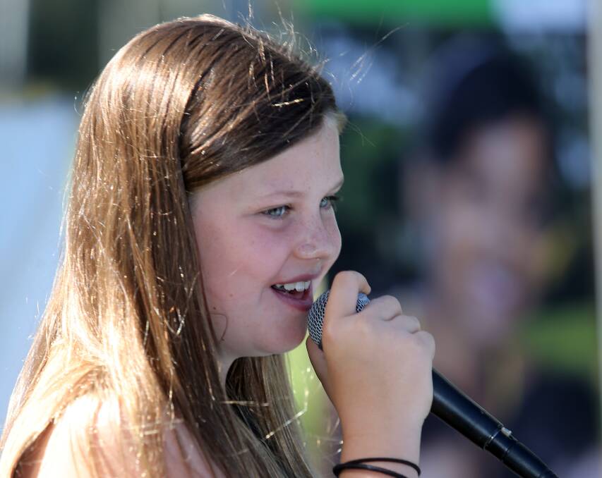 SINGING UP A STORM: South Coast Country Music Association's New Generation Showcase performer Grace Gladwin entertains. Picture: Robert Peet. 