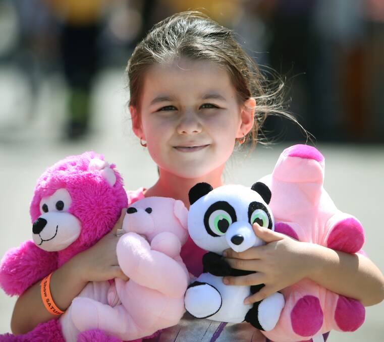  SOME SHOW GOODIES: Raven Nunn, 6, from Thirroul, picked up plenty of soft toys during her Albion Park Show outing on Saturday. Picture: Sylvia Liber
