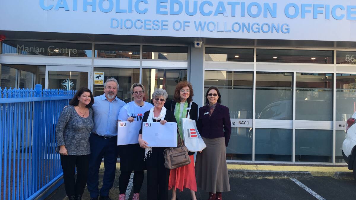 FURTHER ACTION: A petition signed by 840 members from 32 Catholic schools in Wollongong did not solve the dispute.