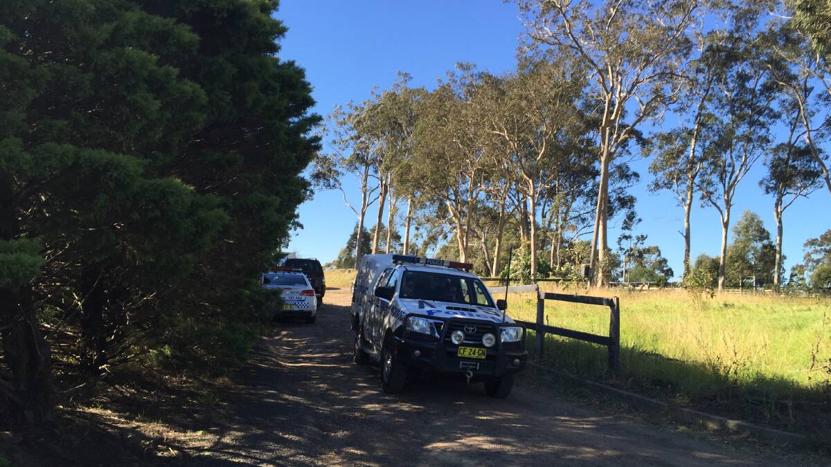 Police swoop on a property in Millbank Road, Worrigee during drug raids on Tuesday morning. 
