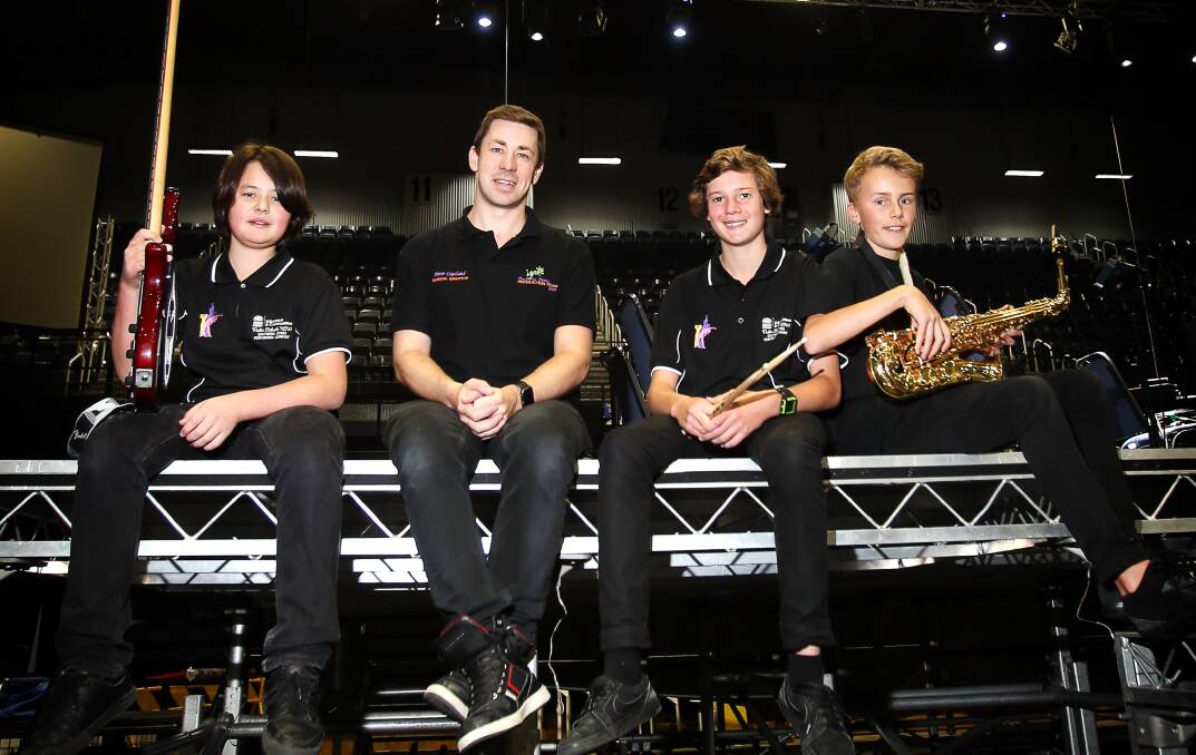 CENTRE STAGE: Southern Stars musical director Peter Copeland (second from left) with musicians Leon Hollstegge, Ethan Johnson and Bailey Craft. Picture: Sylvia Liber