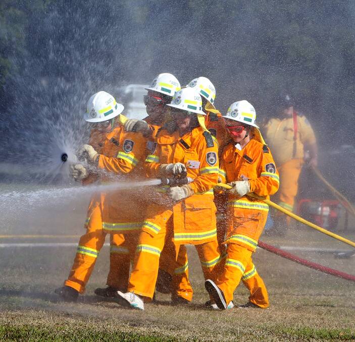 TEAM WORK: Students from Kanahooka High School's support unit have graduated from the NSW Rural Fire Service School Cadet Program where they gained life skills in leadership and team work. Picture: Sylvia Liber
