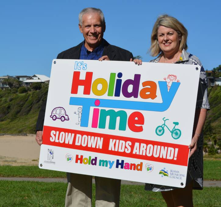Kiama Mayor Brian Petschler with child pedestrian and roadside safety advocate Michelle McLaughlin of the Little Blue Dinosaur foundation in Kiama on Tuesday.