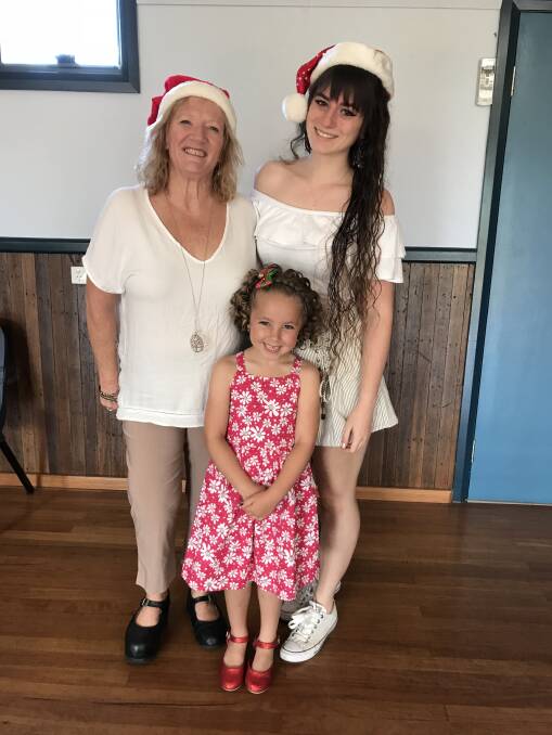 Shellharbour Mayor Marianne Saliba with Sabrina Minns and Charlotte Hooper, who at seven years old is one of the youngest performers at the Shellharbour event, on Sunday. Picture: Supplied