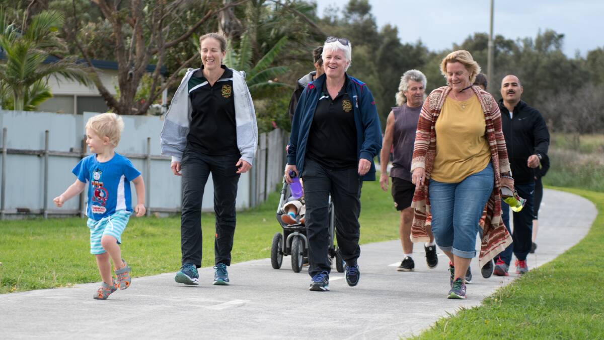 LET'S WALK: Residents participating in one of the ‘5 x 5’ events in Bellambi during May. Healthy Cities Illawarra hosted the events in Bellambi and Lake Illawarra. 