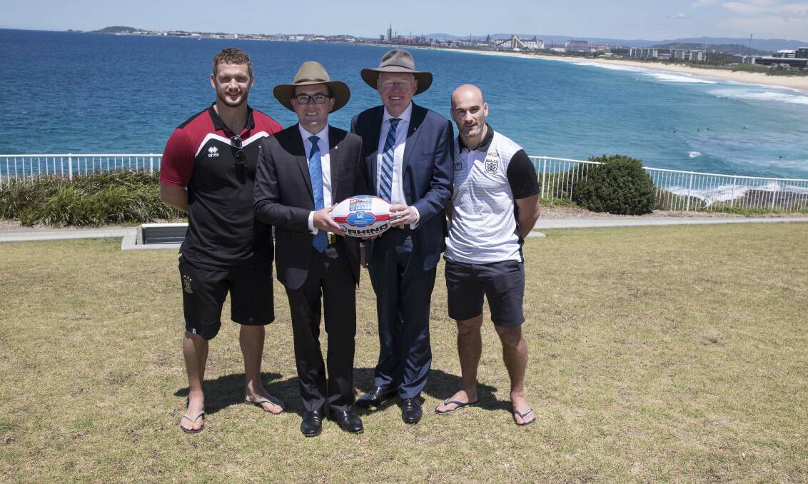 Adam Marshall and Gareth Ward with Wigan captain Sean O’Loughlin and Hull FC captain Danny Houghton on Monday. Picture: Destination NSW