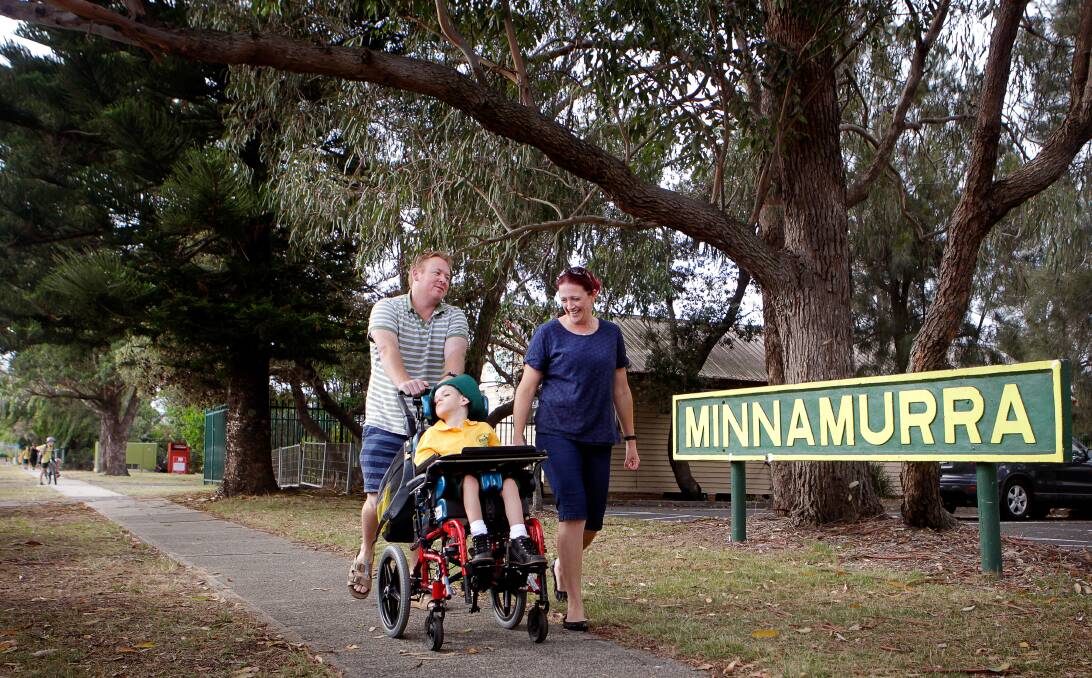 STARTING SCHOOL: Dexter Heffernan with his parents Lenice and Andrew Heffernan at Minnamurra Public School on Thursday morning. Picture: Sylvia Liber 
