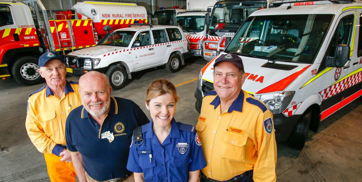 EMERGENCY SERVICES: RFS volunteer Tom Conboy with David Ferne, emergency services coordinator at the Rotary Club of Minnamurra, paramedic Mel Bokenham and Rusty Shore from the RFS. Picture: Adam McLean 