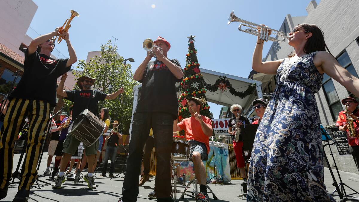 MUSIC: The Con Artists performing at the Honk! Oz festival launch in Wollongong Mall late last year. The annual festival of street music is on from January 11-13. Picture: Adam McLean

