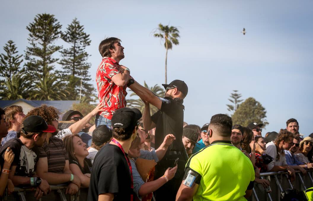Most festival goers were well behaved but there were a small few who got into trouble like this man who got up on stage during Wavves' set . Picture: Georgia Matts