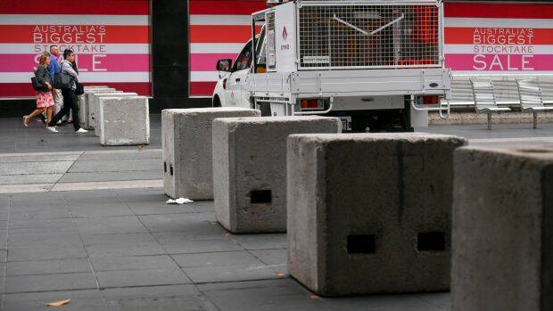 Temporary concrete bollards were erected along major streets in Melbourne for the Australia Day parade this year. Photo: Eddie Jim
