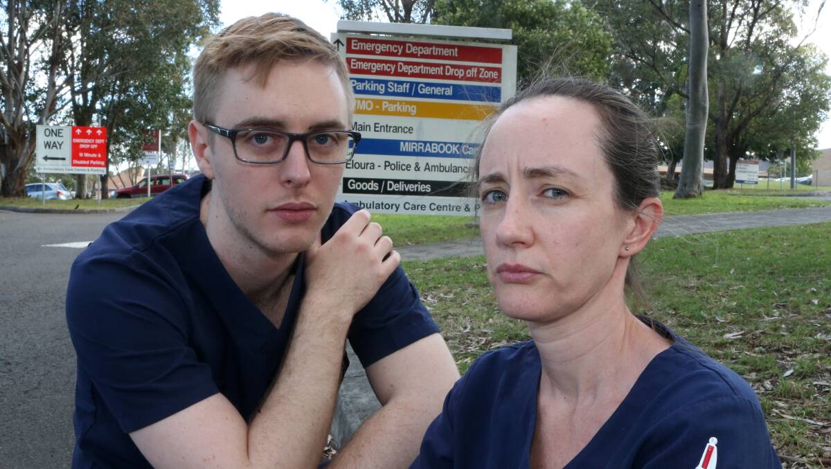 Union delegates Cameron Creighton and Aimee Johnson outside Shellharbour Hospital. Photo: Robert Peet