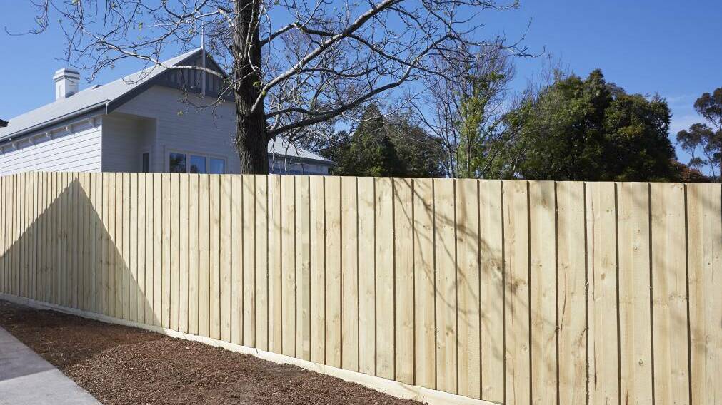 A file image of a fence dividing two properties. 