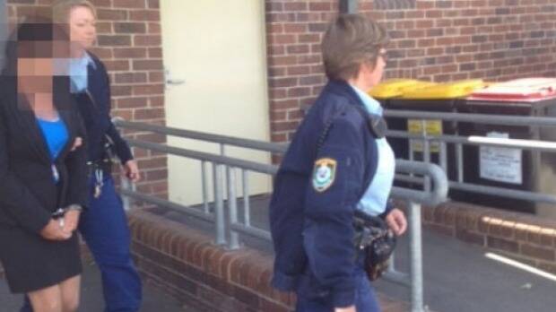 Police lead Betty Colt from Moss Vale Court in November last year.