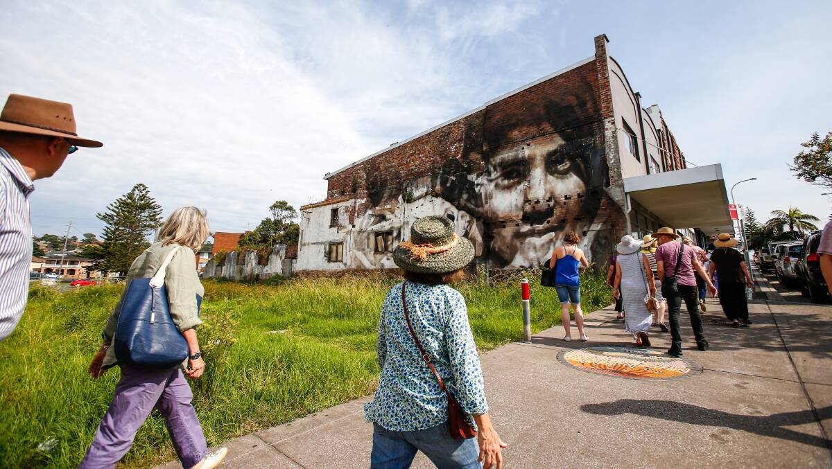 The walking tour meets with wall-art on Wentworth Street. Picture: Adam McLean