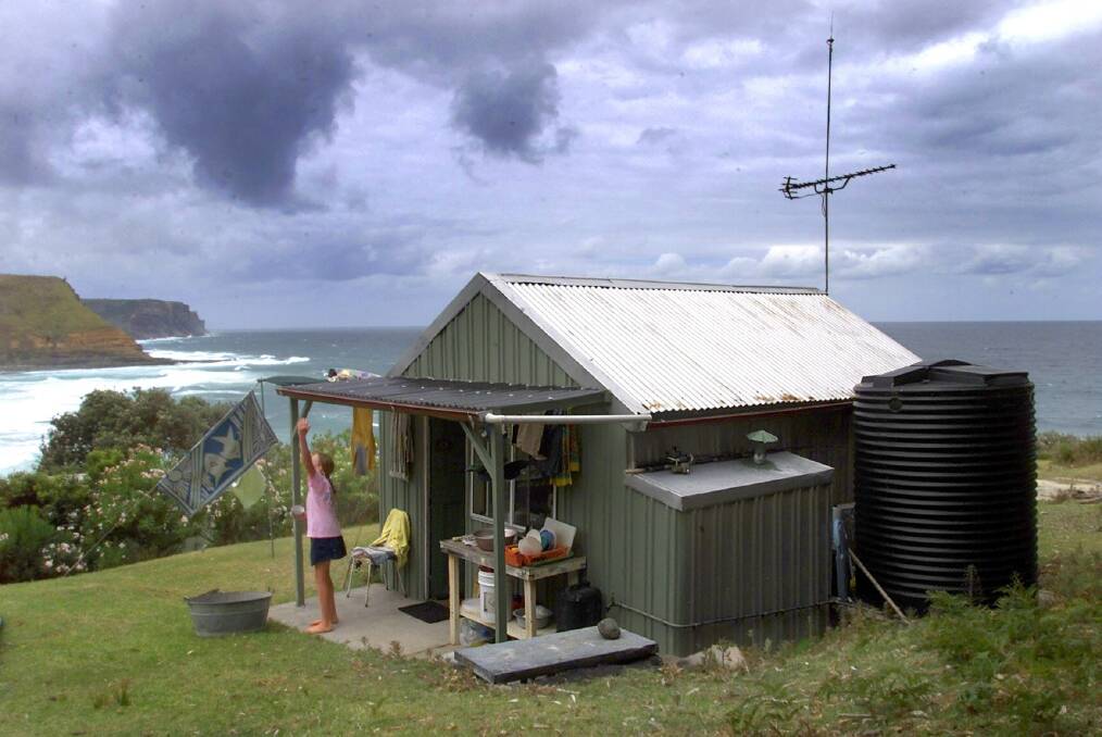 Some of the beach shacks at Garie Beach, built during the Great Depression and now heritage-listed. 