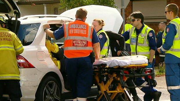 Emergency workers attend the scene of the crash. Photo: ABC NEWS