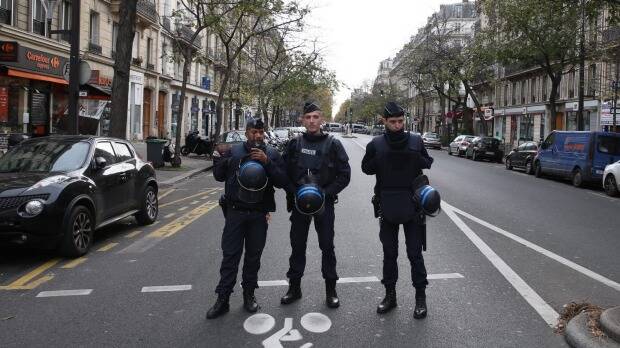 French police guard Boulevard Voltaire near the Bataclan theatre. Photo: Andrew Meares