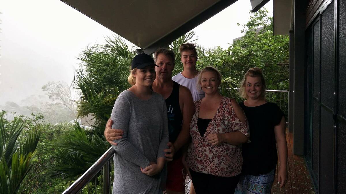 Dapto woman Samantha Burnhams, pictured with her family, are stuck on Hamilton Island as Cyclone Debbie hits. Picture: Supplied