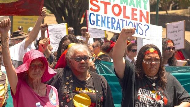 Protesters campaign against the removal of Aboriginal children. Photo: Paddy Gibson
