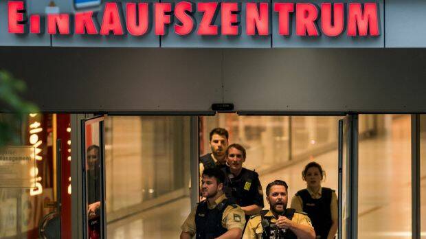 Police officers respond to a shooting at the Olympia Einkaufzentrum shopping centre. Photo: Getty Images
