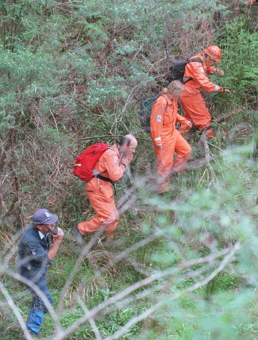 Victorian Police and SES search bush near Fiddlers Green Creek.