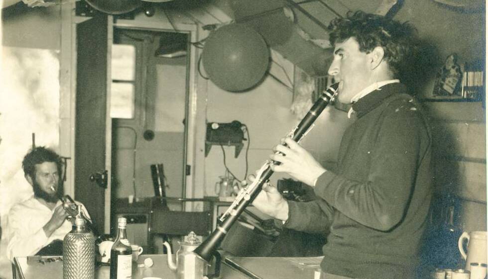 Peter plays a clarinet in Antarctica, 1955.