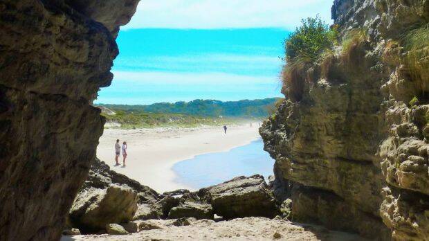 Peering out of the large cavern at Booderee's Cave Beach. Photo: Tim the Yowie Man

