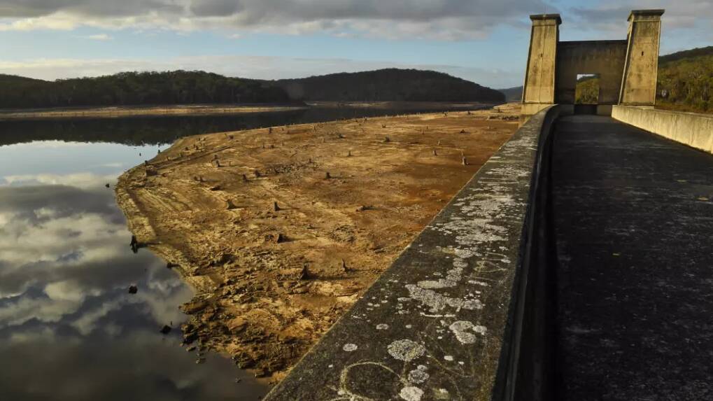 Sydney Water's Cordeaux Dam near Wollongong is now about 37 per cent full, down from about 90 per cent a year ago. Photo: Nick Moir