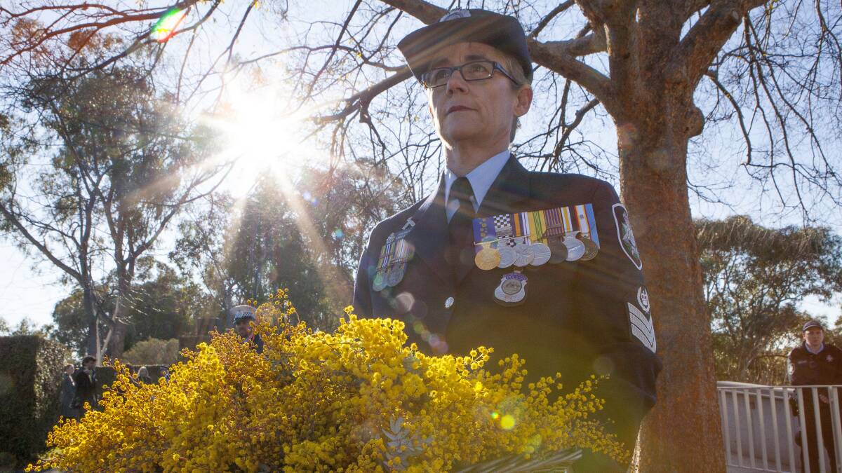 The AFP's Danielle Woodward at a memorial for MH-17 victims in Canberra in July. Picture: Kate Geraghty