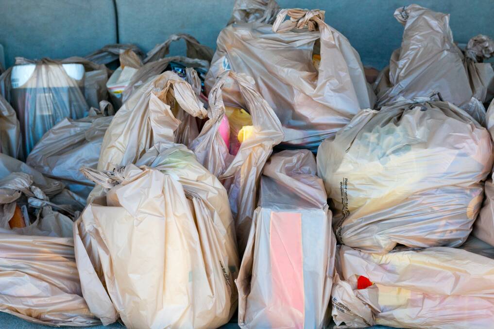 By July 2018, single-use plastic bags will no longer be given out at Woolworths stores.  Picture: Belen Strehl
