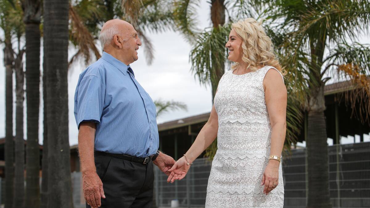 She is pictured with her father-in-law Tony at Kembla Grange where a race was named in Mick's honour. Pictures: Adam McLean