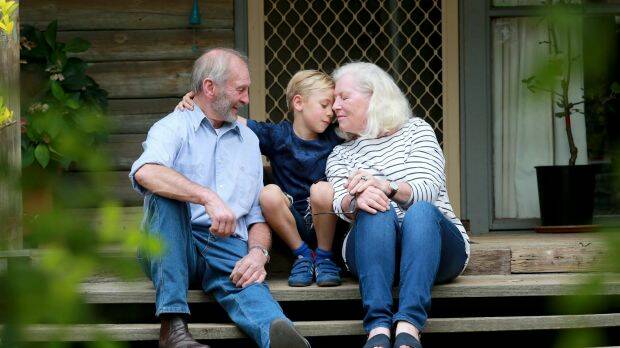 Christine and John Snelling with their grandson, six-year-old Cassius. Photo: Wayne Taylor
