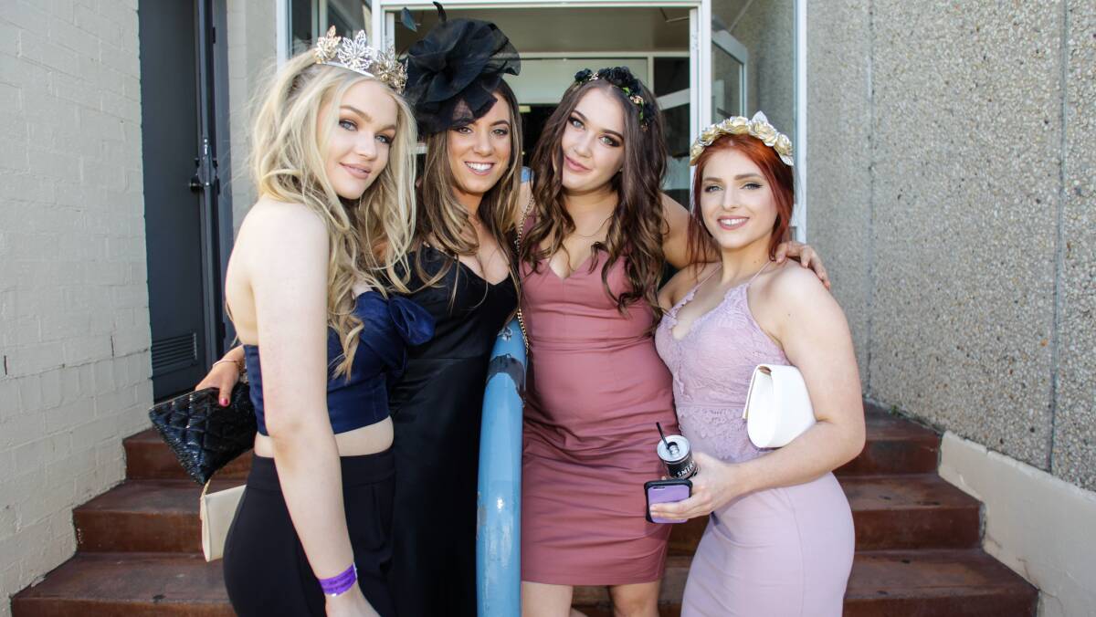 Charlotte Hall, Alanna Woods, Georgia Conway and Shania Rae at Kembla Grange Racecourse for Melbourne Cup celebrations at Kembla Grange racecourse during celebrations on Melbourne Cup day.