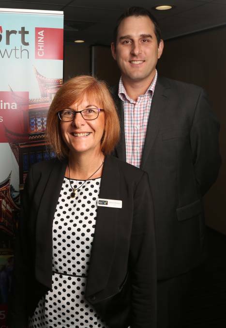 Illawarra Business Chamber's Debra Murphy is impressed with Daniel Rowan and the Internetrix team's achievements in China. Picture: Greg Ellis