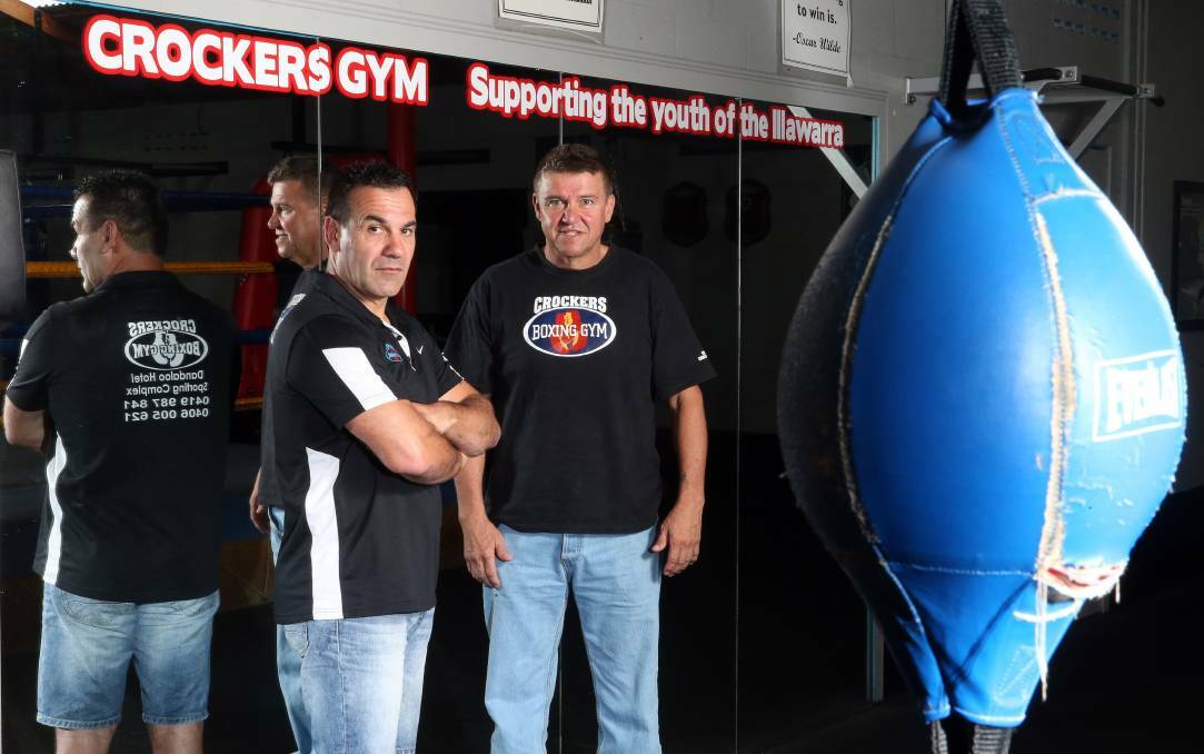 Vito Gaudiosi, a former NSW Police officer, with friend Joe Lopez in the Crocker's gym at Brownsville. 