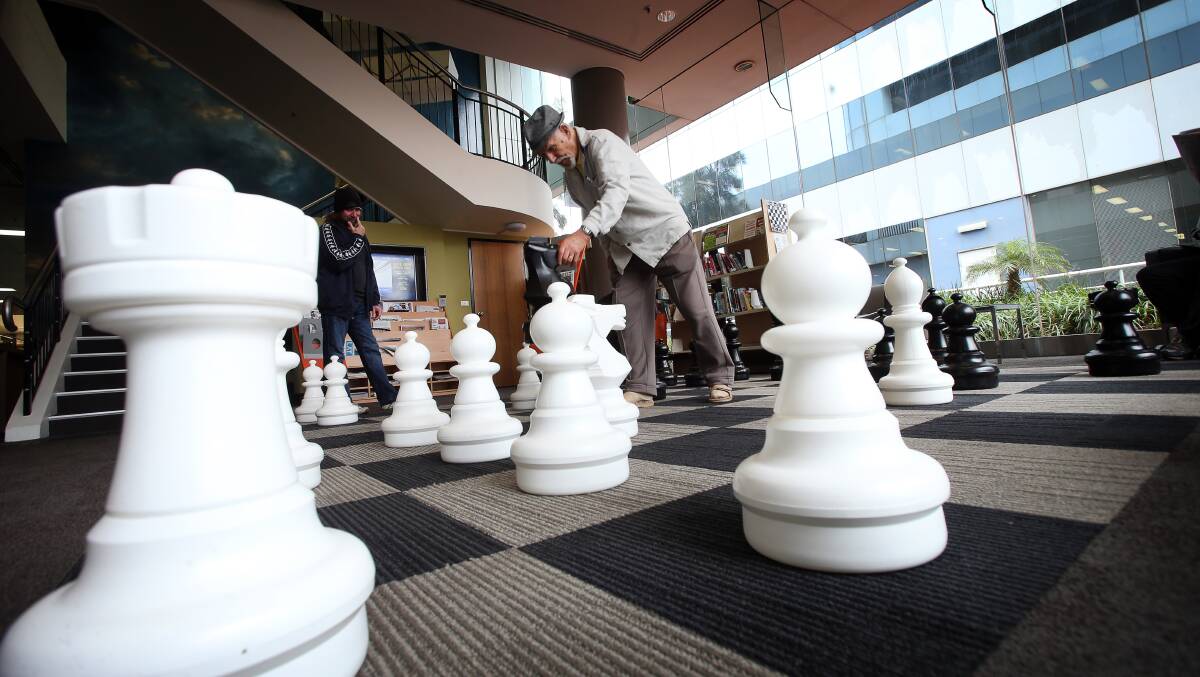 George Czubala plays chess with Steve Hawton. Photos: Sylvia Liber.