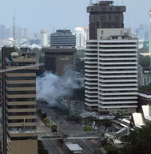 Smoke billows from an explosion in Jakarta, Indonesia, on Thursday. Photo: AP