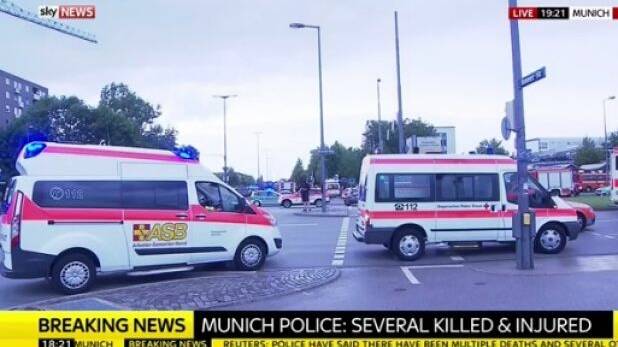 Emergency vehicles near the shopping mall in Munich where shots have been fired. Photo: Screenshot, Sky News
