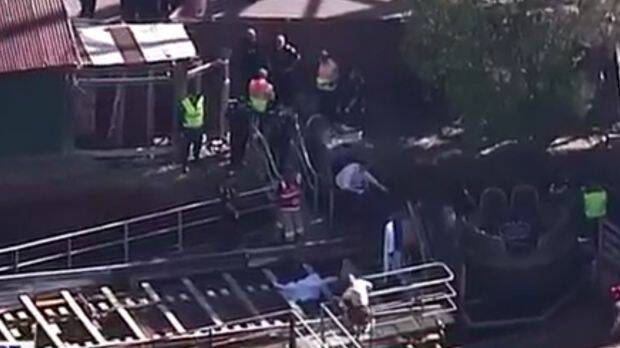 Paramedics rushed to the theme park with reports up to four people were critically injured. Photo: Twitter / 7 News
