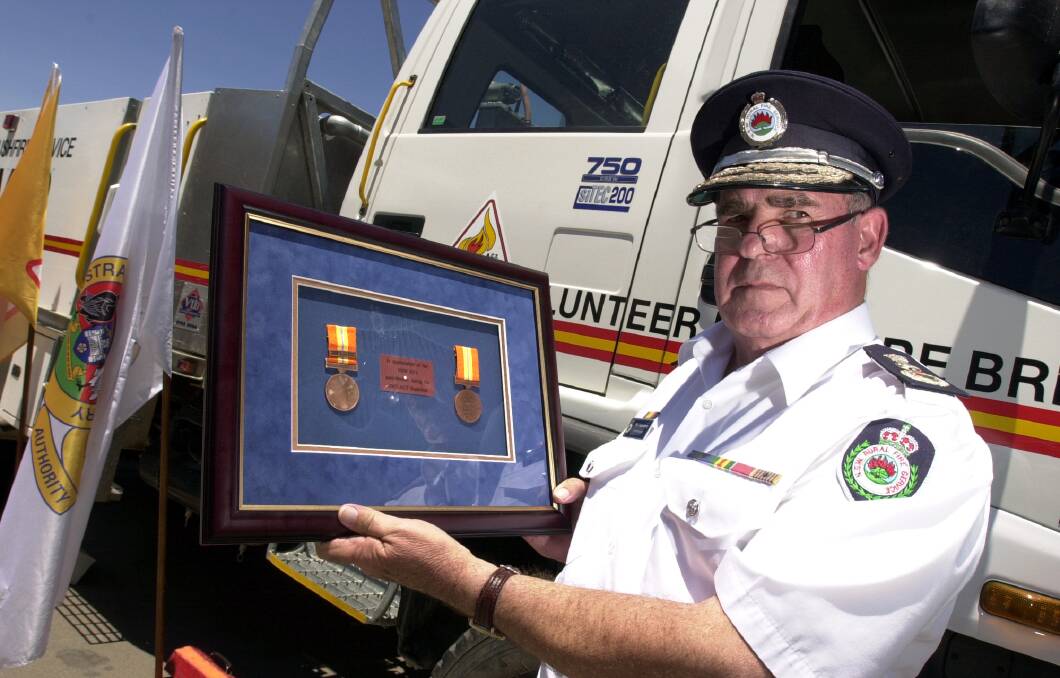 NSW RFS Commissioner Phil Koperberg was presented with the ACT Emergency Service Medal in November 2004.