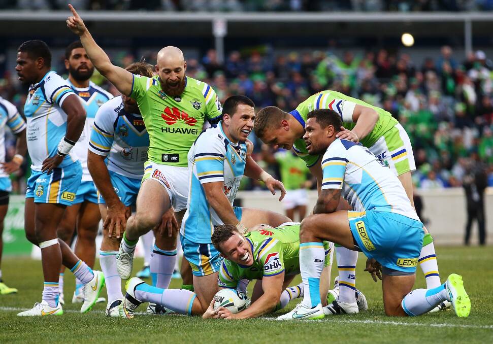 Canberra's Sam Williams scoring a try against the Titans on Saturday. Picture: GETTY IMAGES