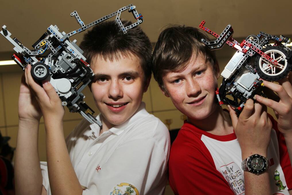 Lego builders Ethan Ilievski, left, and Luin Mulvihill at the international science and robotics event at Unanderra.Picture: GREG TOTMAN