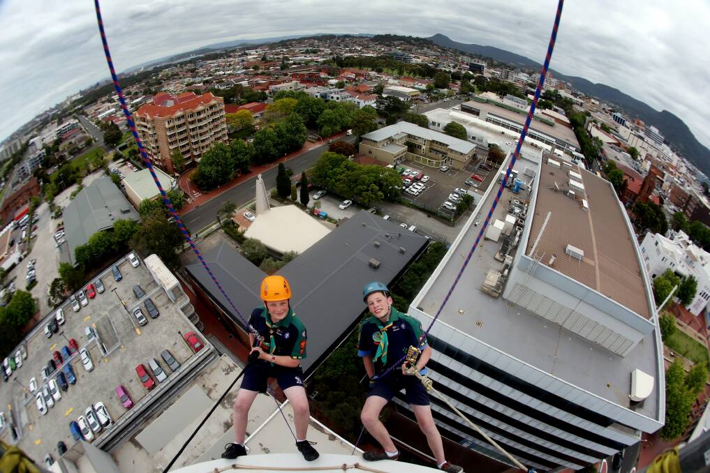 Brothers Ashton and Haydn Low, both 13, about to abseil down the Wollongong City Council building. The public can take part from November 29-30. Picture: ROBERT PEET