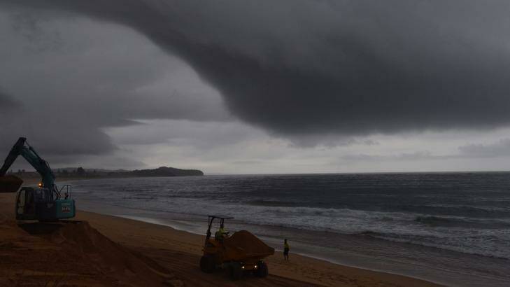 A storm cell moves along the coast at Narrabeen on Sydney's northern beaches on Wednesday.  Photo: Nick Moir 