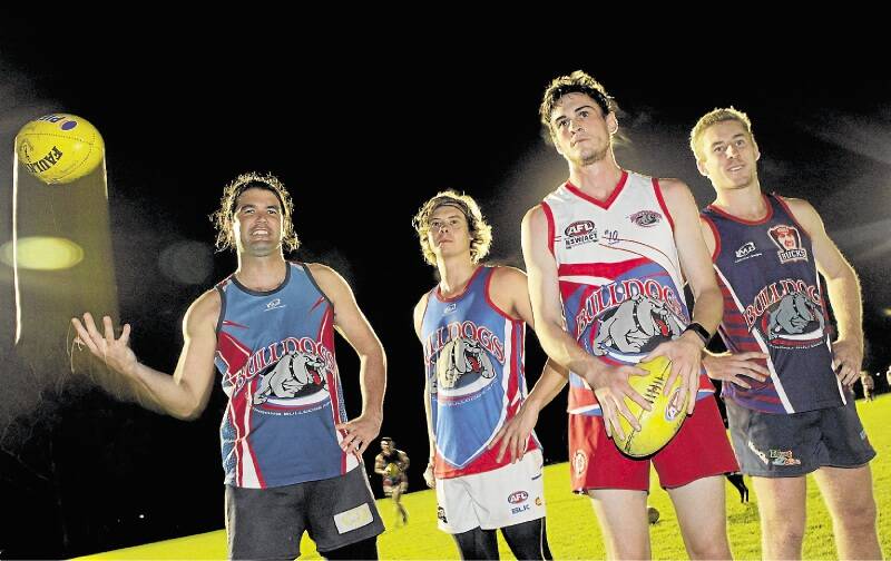 Challenge: Wollongong Bulldogs (left to right) Brad Andriske, Ben O'Kane, Andrew Barned and Jack Wells are ready for the top-of-the-table clash with Wollongong Lions at North Dalton Park on Saturday. Picture: ANDY ZAKELI