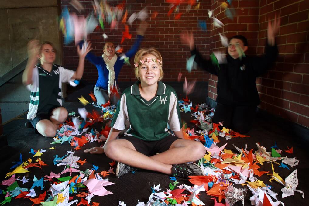 Legend: Warrawong High student Caitlin Cooper has organised to make 1000 cranes for another student who has leukaemia. Picture: SYLVIA LIBER